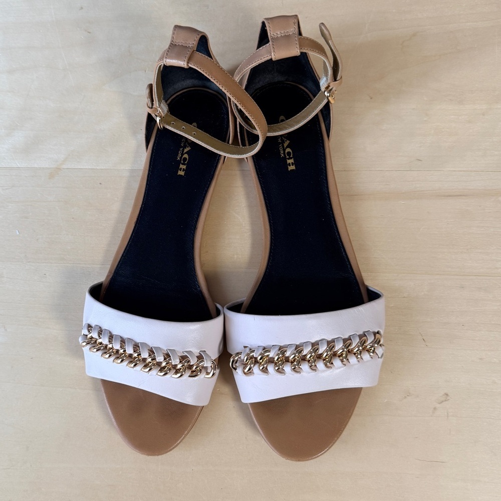 Coach Seabreeze Leather
Ankle Strap Sandal w/chain detail in white and tan.